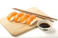 Sliced Ã¢â¬â¹Ã¢â¬â¹salmon fillet arranged in a plate with sauce cups placed in front. Royalty Free Stock Photo